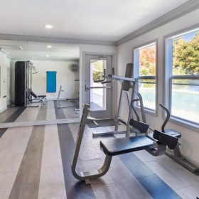 State-of-the-art amenities a gym with exercise equipment
