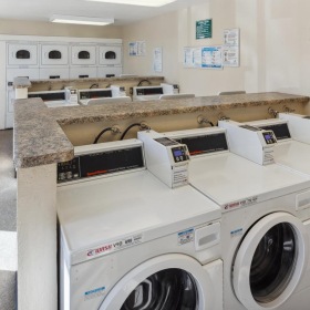 We've got your laundry sorted a room with washing machines and a counter